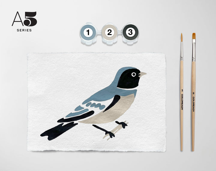 The completed painting of the swallow,  two paint brushes and three small containers of blue, gray and black paint. In the upper left corner is the text A5 series.