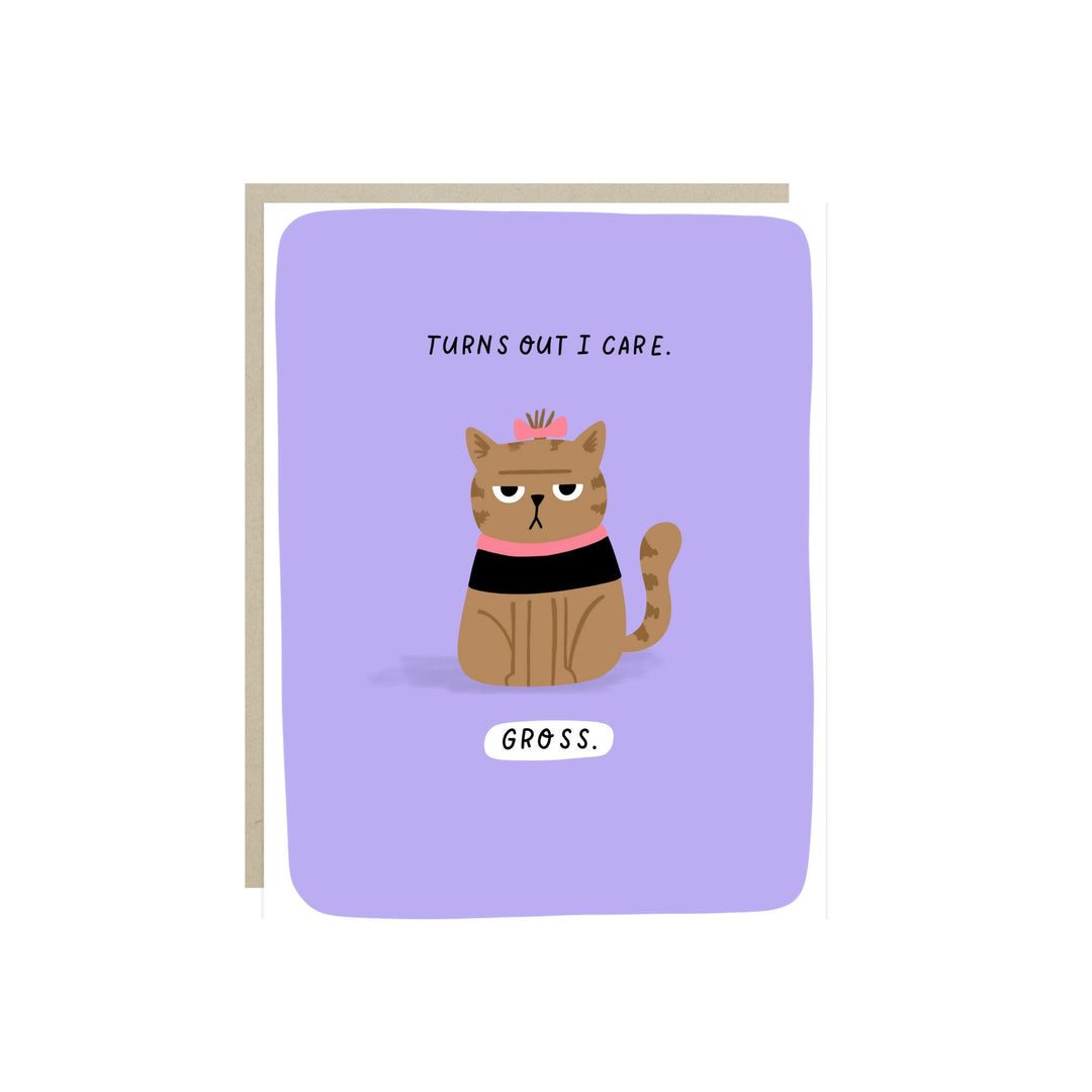 Front of card with an illustration of a brown cat with a pink bow and collar, and looking rather bored, on a purple background.  The text is "Turns out I care. Gross."