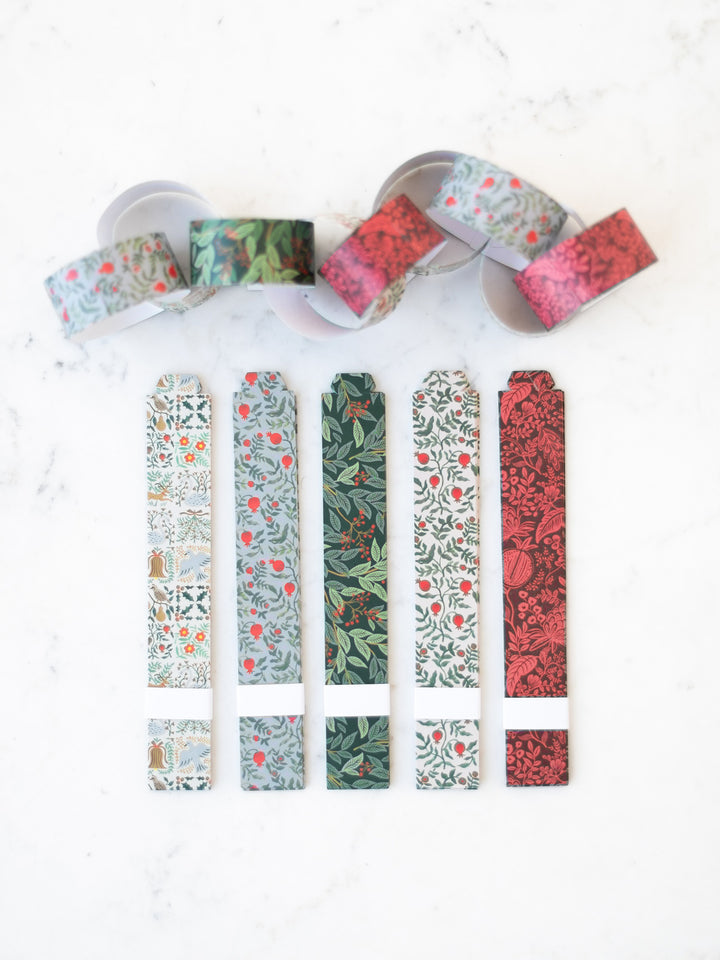 Completed paper chain above the five strips with seasonal patterns.