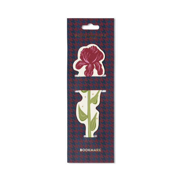 Bookmark in the shape of a burgundy iris, packaged on a navy and burgundy cardboard backing.