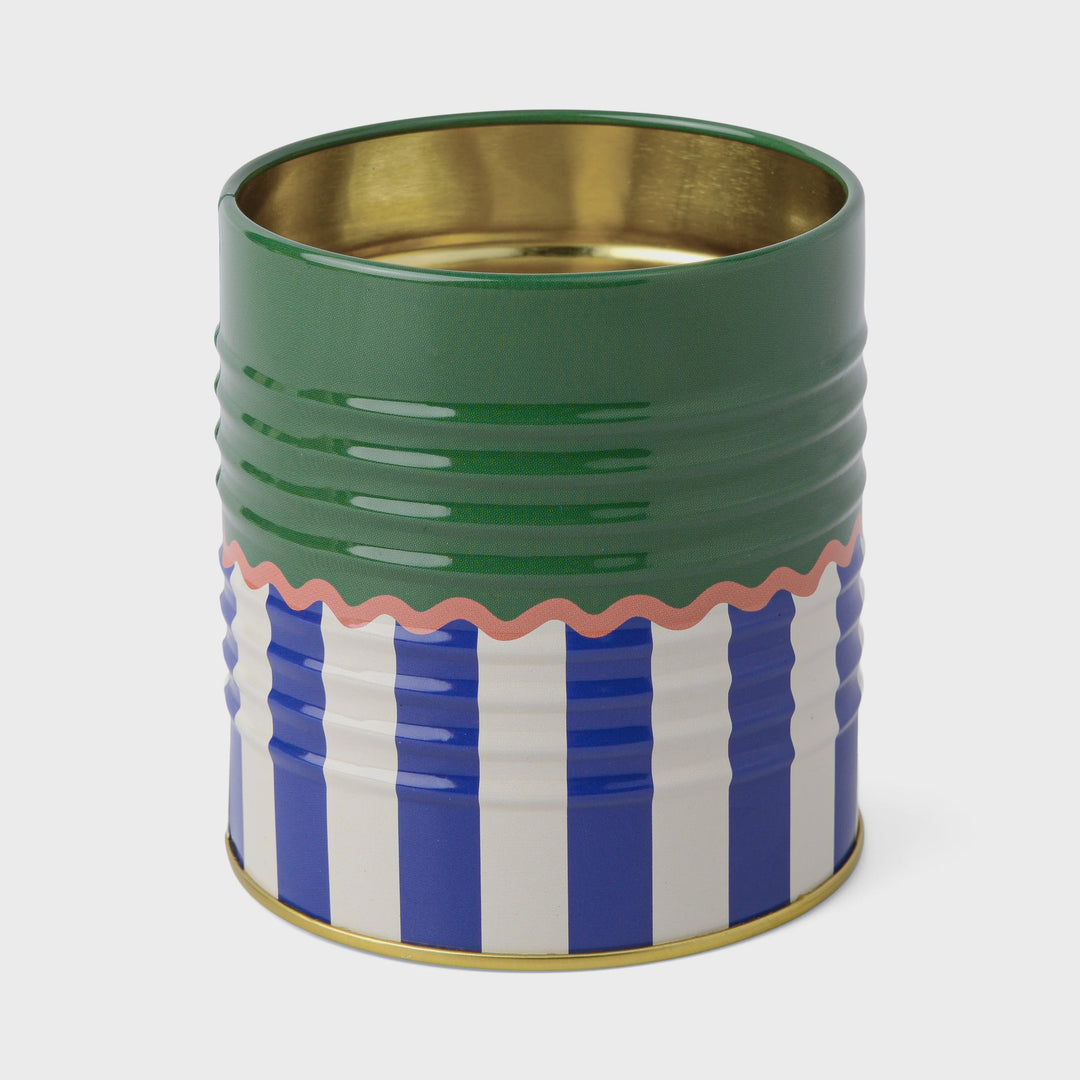 Painted tin with gold interior and exterior of a solid green top half and blue and white striped bottom half, with a pink zigzag between.