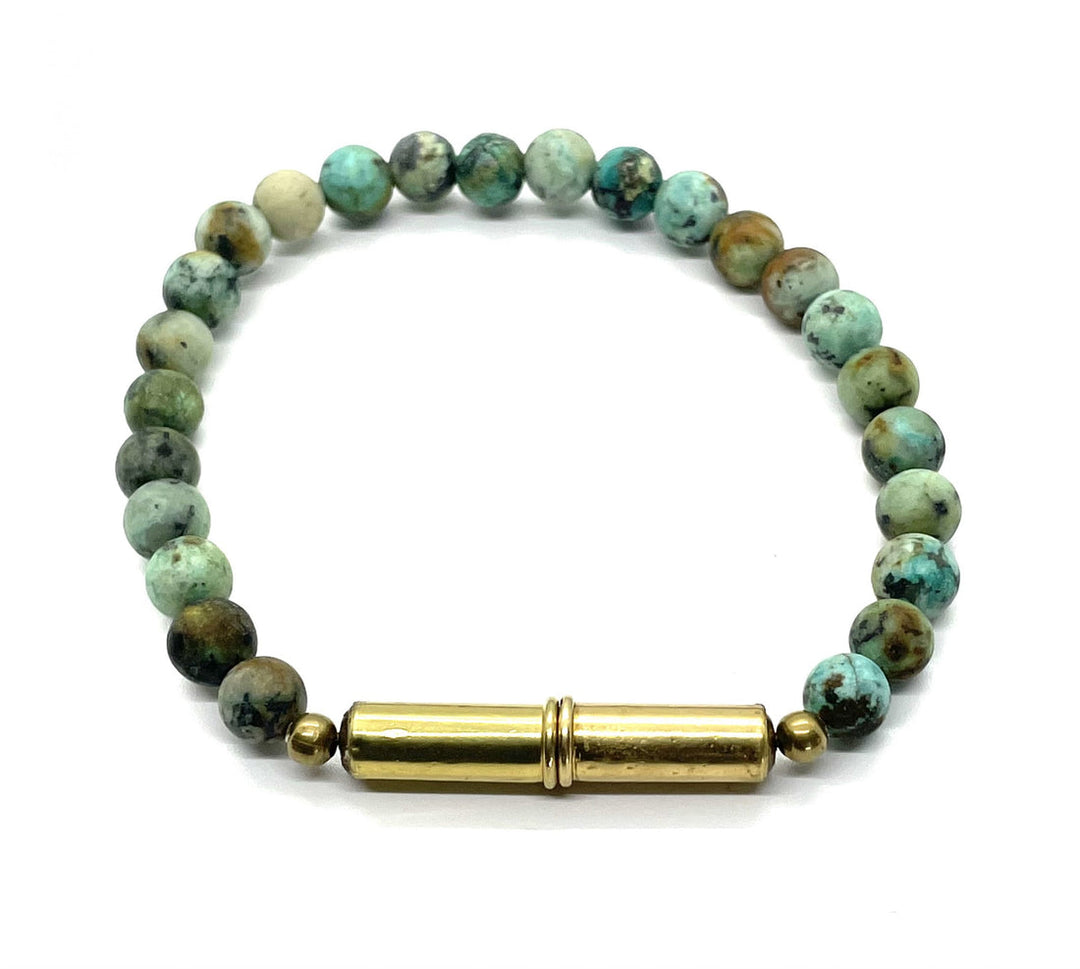 Turquoise beaded bracelet with a brass magnetic clasp.