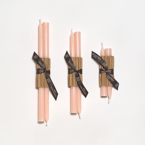 6 inch beeswax taper candle in blush. Shown with two other sizes for comparison.