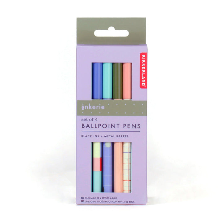Set of 4 patterned ballpoint pens in pastel colors with packaging.