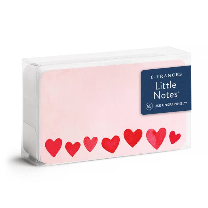 Packet of E. Frances 'Little Notes' note cards with a drawing of seven small red hearts of various sizes along the bottom on a blush card.