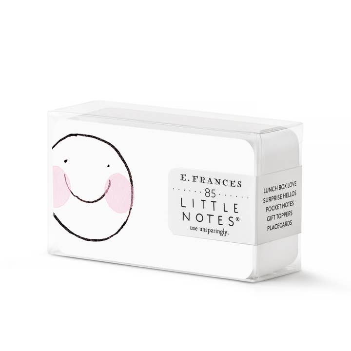 Packet of E. Frances 'Little Notes' note cards with a line drawing of a simple white smiley face with pink cheeks on each.