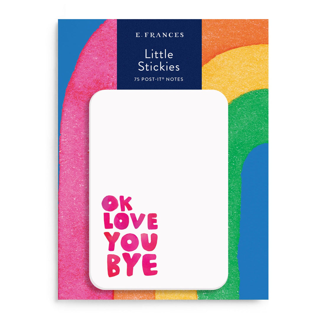 White post-it notes with OK LOVE YOU BYE at bottom left, on a package with colorful arcs.