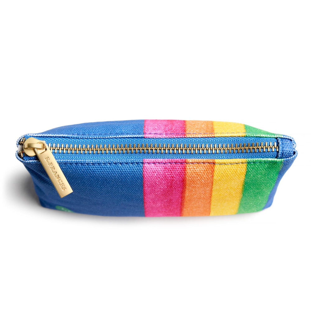View of pouch from the top, showing the gold zipper and stripes on both sides.
