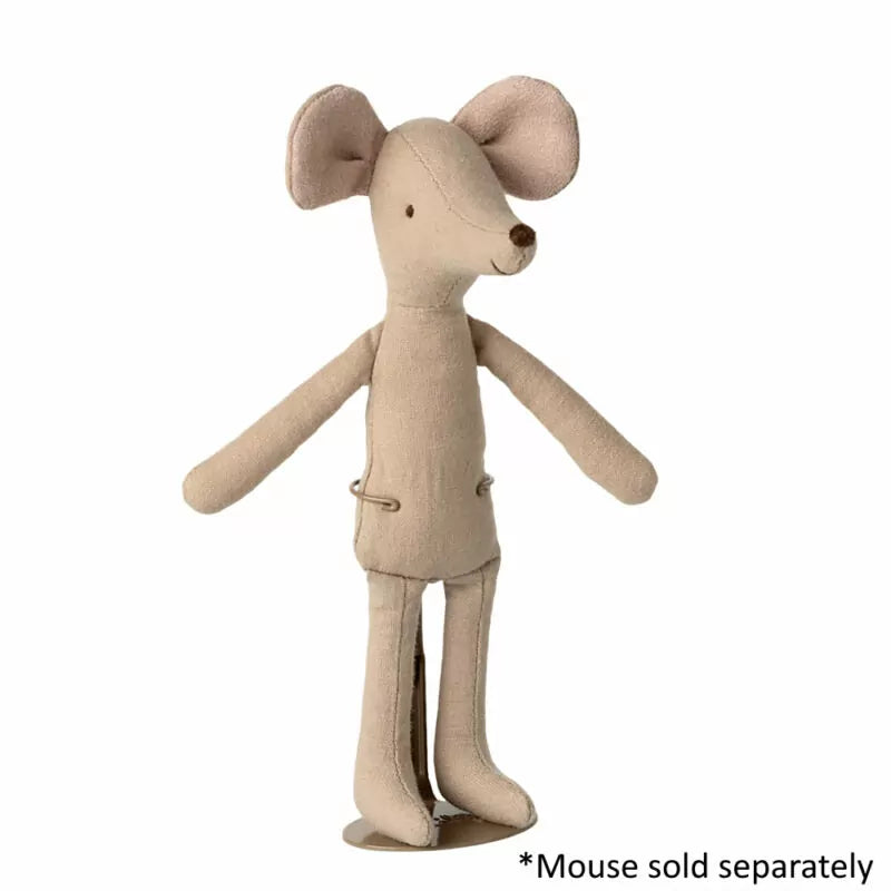 Mouse supported in stand.