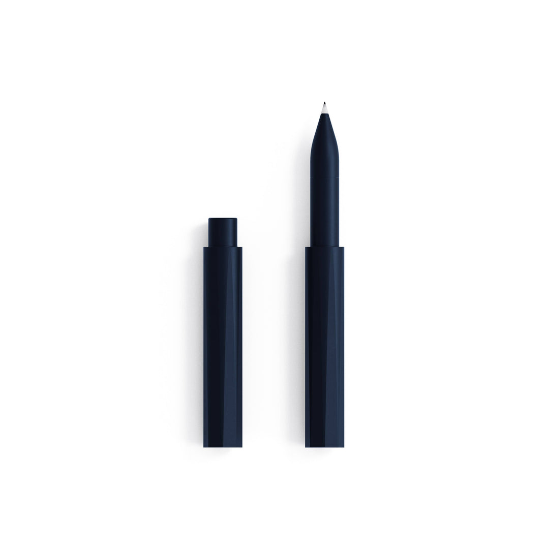 Pen with cap removed in dark navy.