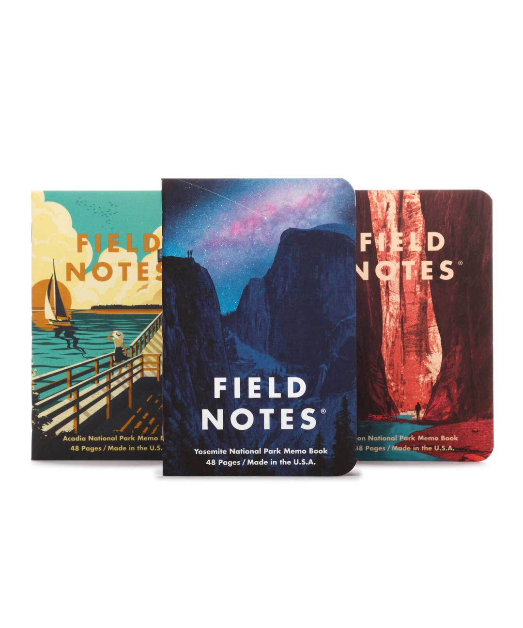 Covers of three memo books with colorful images from Acadia, Yosemite, and Grand Canyon National Parks. 