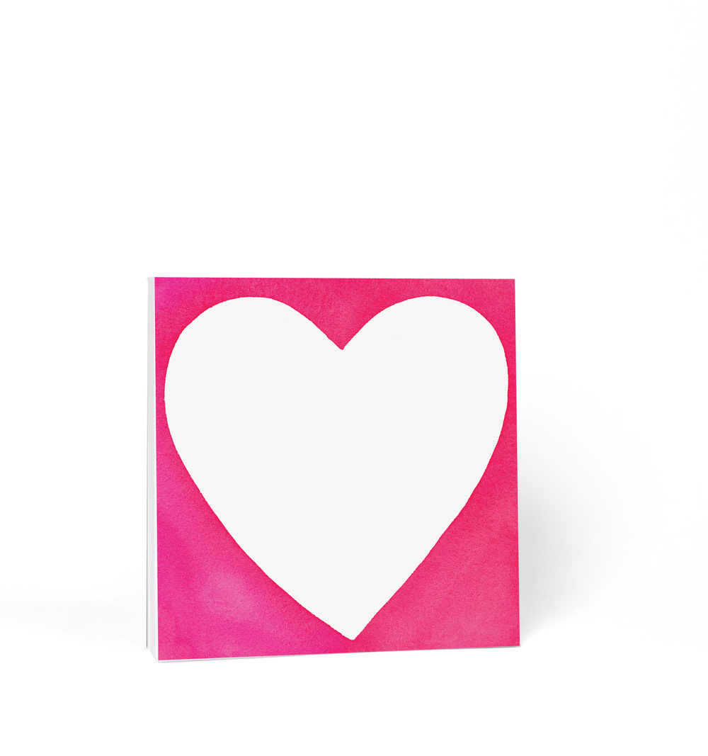 Square pad with large white heart on a red background.