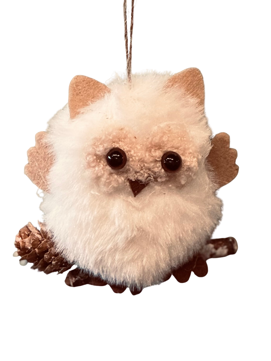 Plush owl ornament with a pine cone.