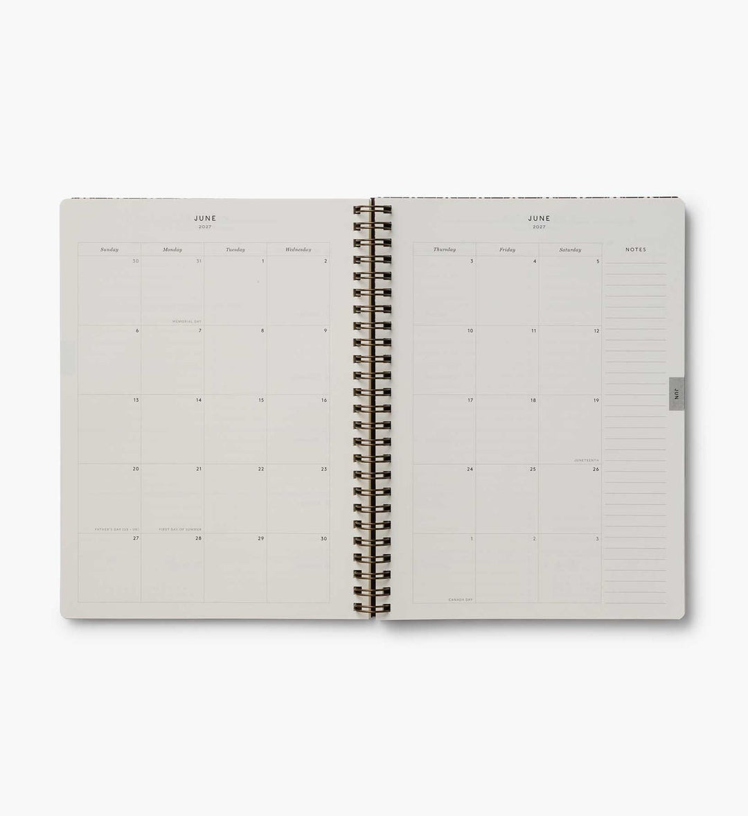 Lay-flat, two-page spread of a month, with space for notes at the right edge.