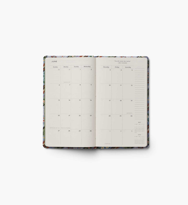 Two-page spread showing space for each day in a month, with space for notes on the right edge.