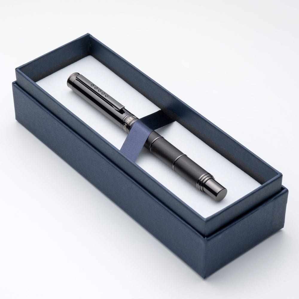 Fountain pen with cap on in blue gift box.