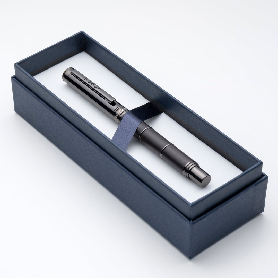 Fountain pen with cap on in blue gift box.