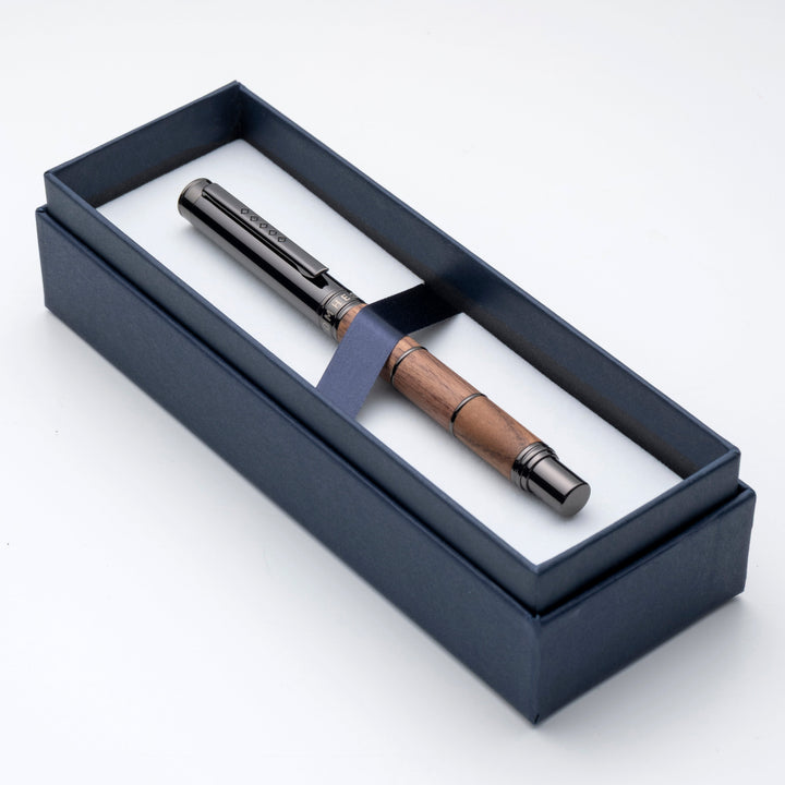 Rustic style fountain pen in open blue gift box.