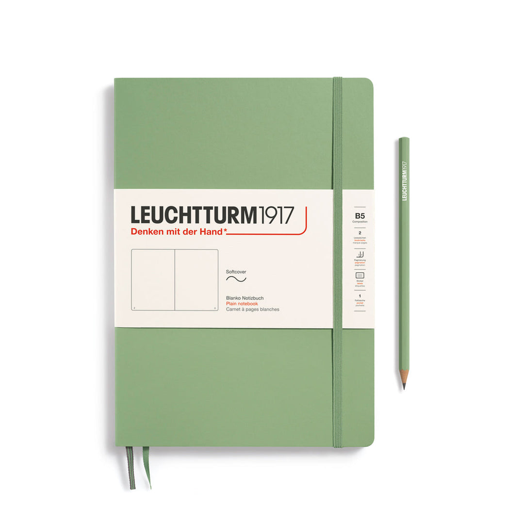 Leuchtturm1917 soft cover plain page notebook in sage green with white label and elastic closure, next to sage green Leuchtturm1917 pencil.