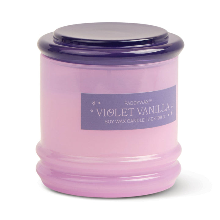 Glass container for candle with lavender body and purple lid.