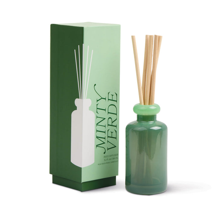 Green diffuser bottle with light green collar at the top and five wooden sticks next to a matching box.