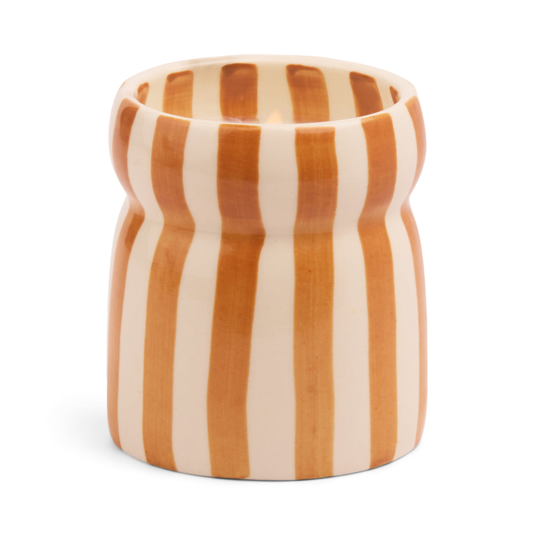 Ceramic candle holder with dark orange and off white vertical stripes.