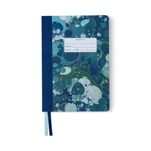 Cover of notebook with blue and green marbled cover with white label for identifying contents.
