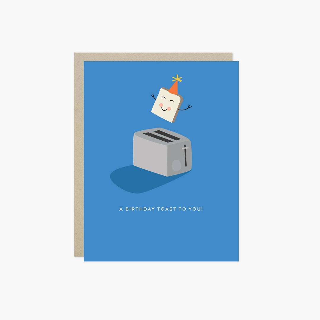 Smiling toast wearing a party hat popping out of a stainless toaster above the text ' A Birthday Toast to You!' on a blue background.