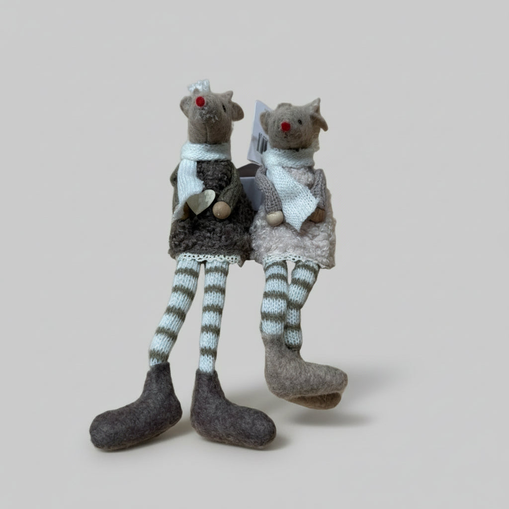 Felt and fabric mouse with long legs wearing striped leggings and a white scarf around their neck.  