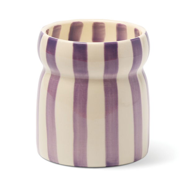 Ceramic candle holder with violet and off white vertical stripes.
