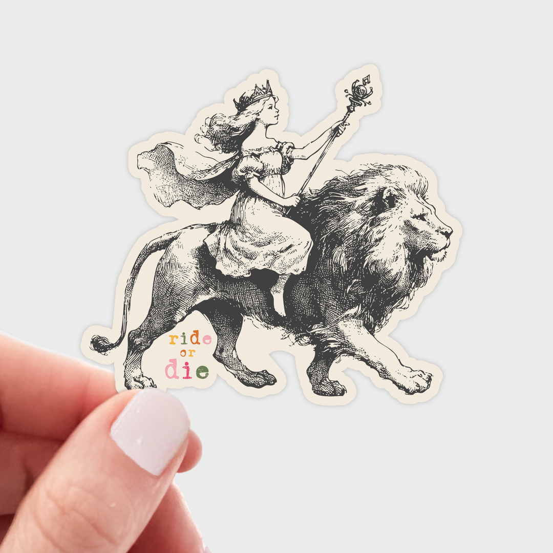 Sticker of a woman riding a lion with 'ride or die' text.