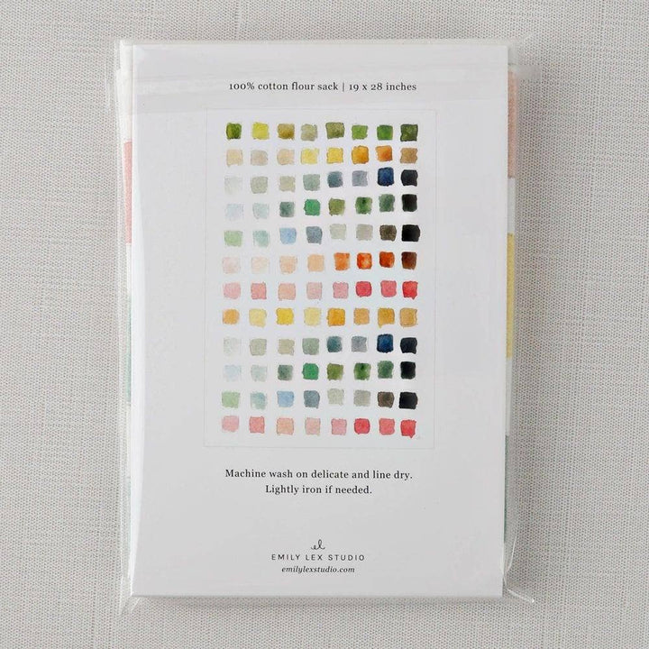 Back of package showing the unfolded towel.