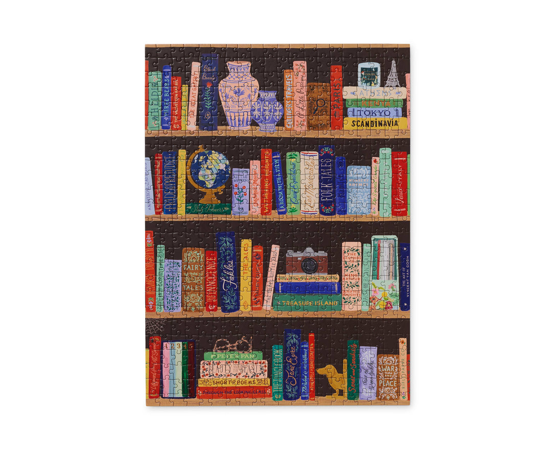 Completed puzzle of a bookshelf with books and objects.