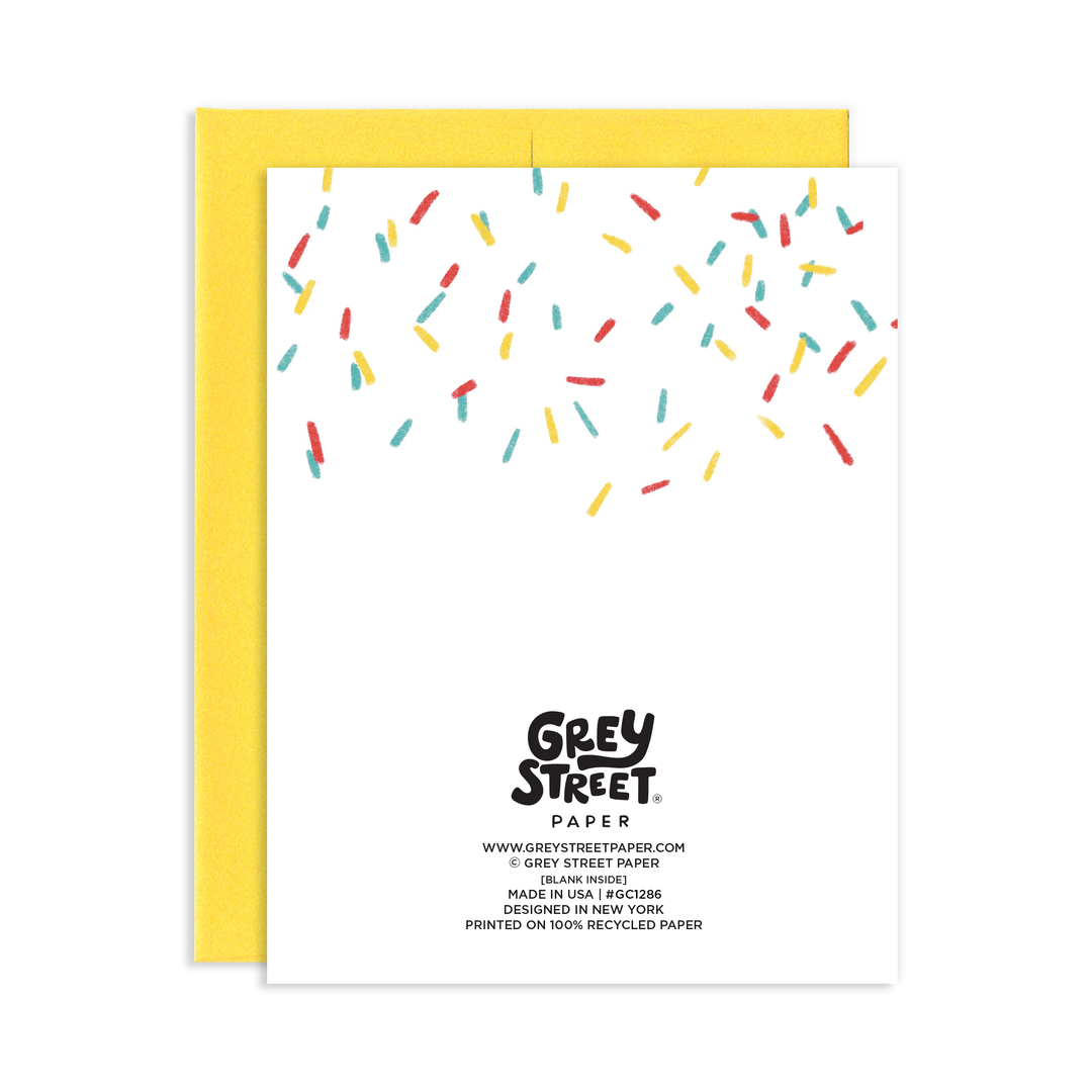 Back of card with confetti at the top and Grey Street info at the bottom.