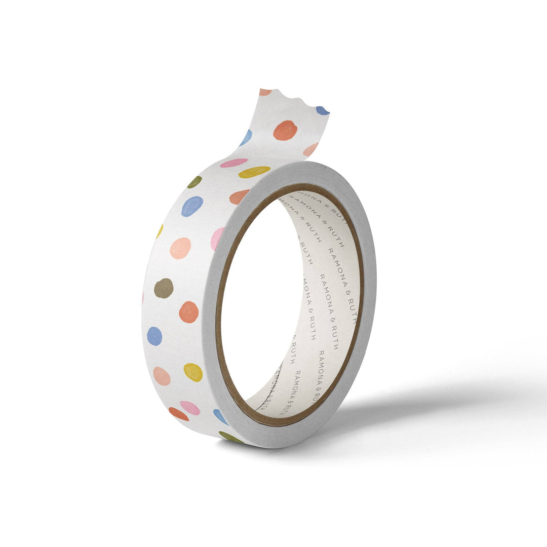 Roll of tape with colorful polka dot pattern.