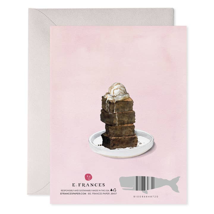 Back of card with a plate stacked with chocolate brownie squares and a scoop of ice cream on top.