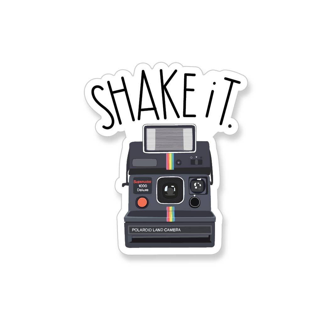 'SHAKE IT!' text above a classic polaroid camera.
