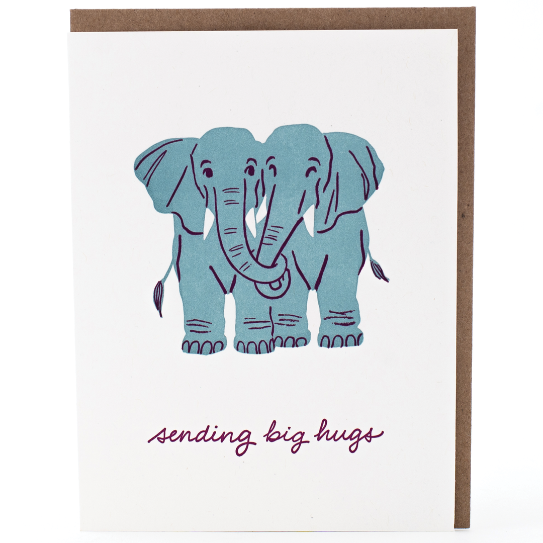Drawing of two blue elephants hugging above the text 'sending big hugs' 