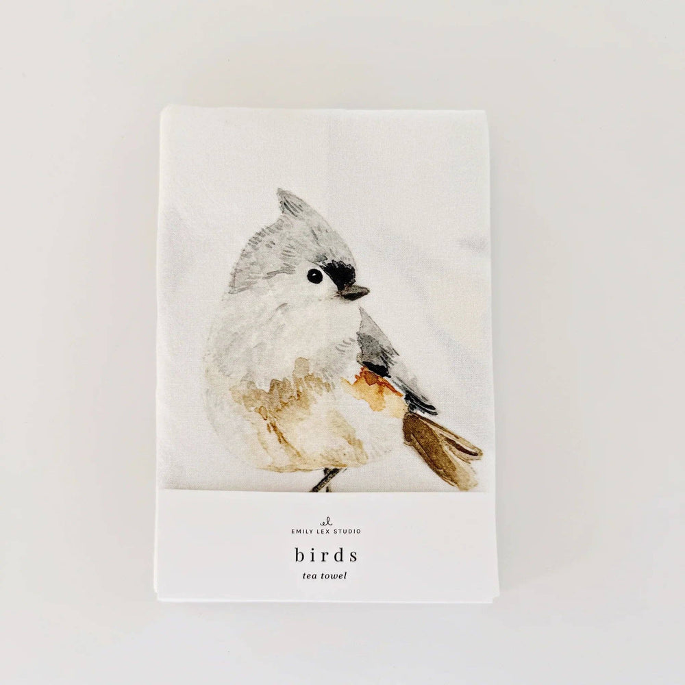 Towel in its package with a sweet bird showing.