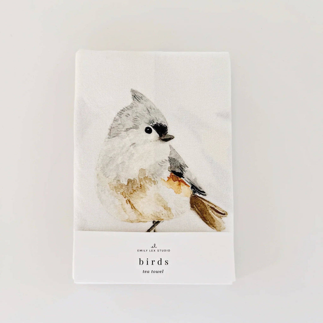 Towel in its package with a sweet bird showing.