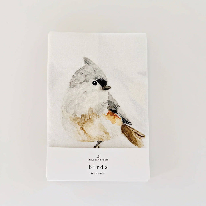Towel in its package with a sweet bird showing.