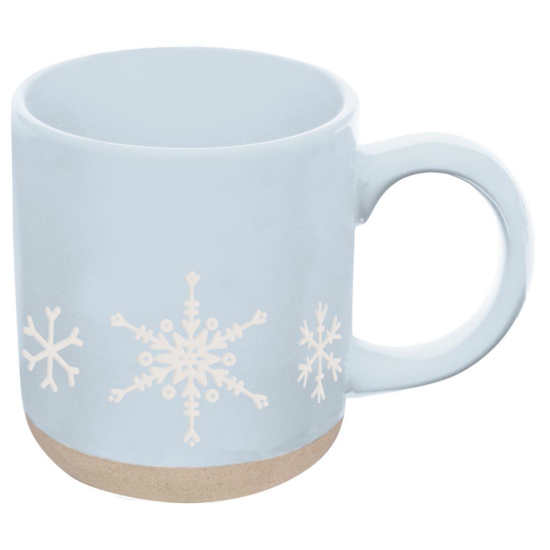 Light blue mug with snowflake designs around the bottom.