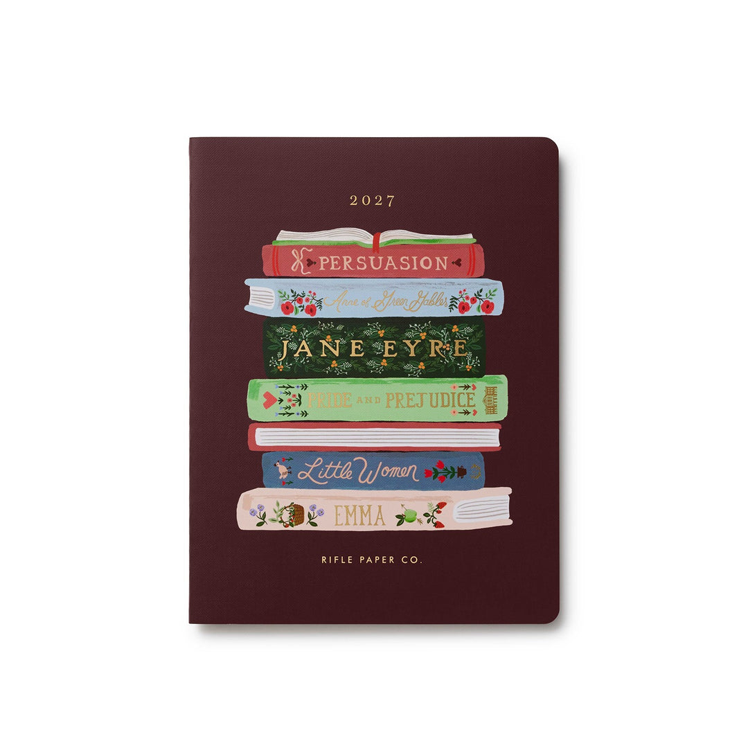 Cover of planner with a stack of books by Jane Austin and others, on a brown background.