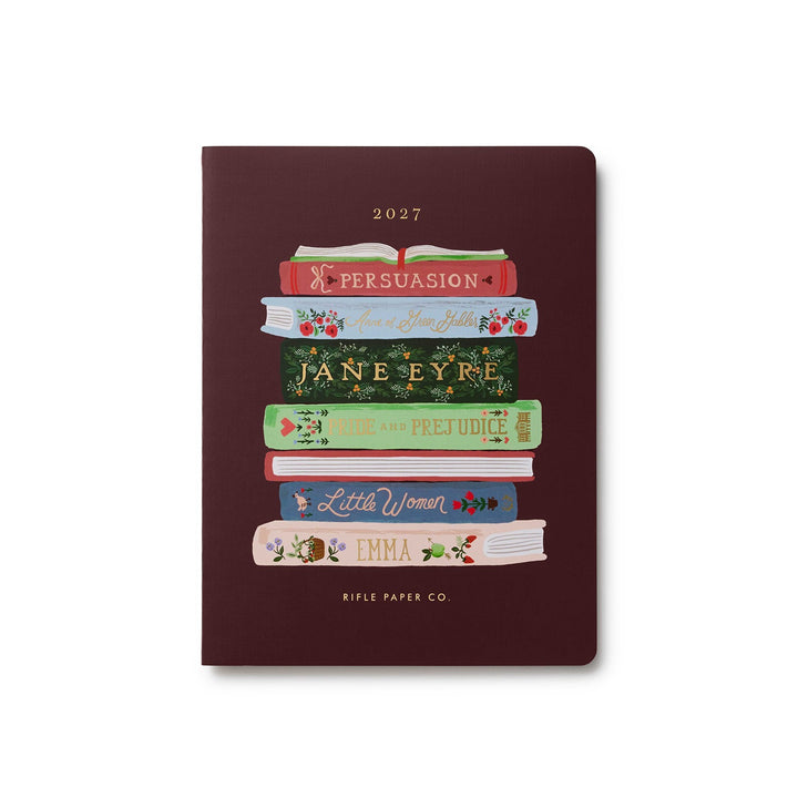 Cover of planner with a stack of books by Jane Austin and others, on a brown background.