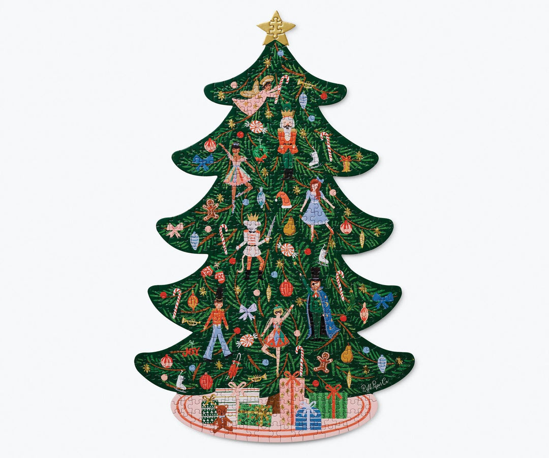 The completed puzzle in the shape of a decorated Christmas tree with a gold star on top and tree skirt with presents at the bottom.