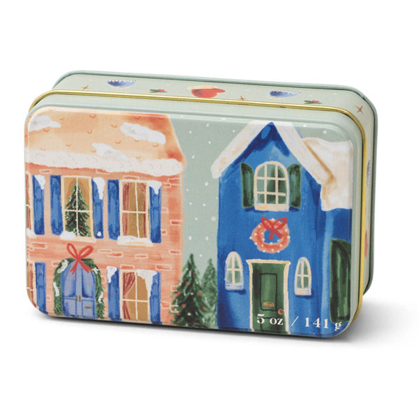 Decorative tin with two houses decorated for the holidays