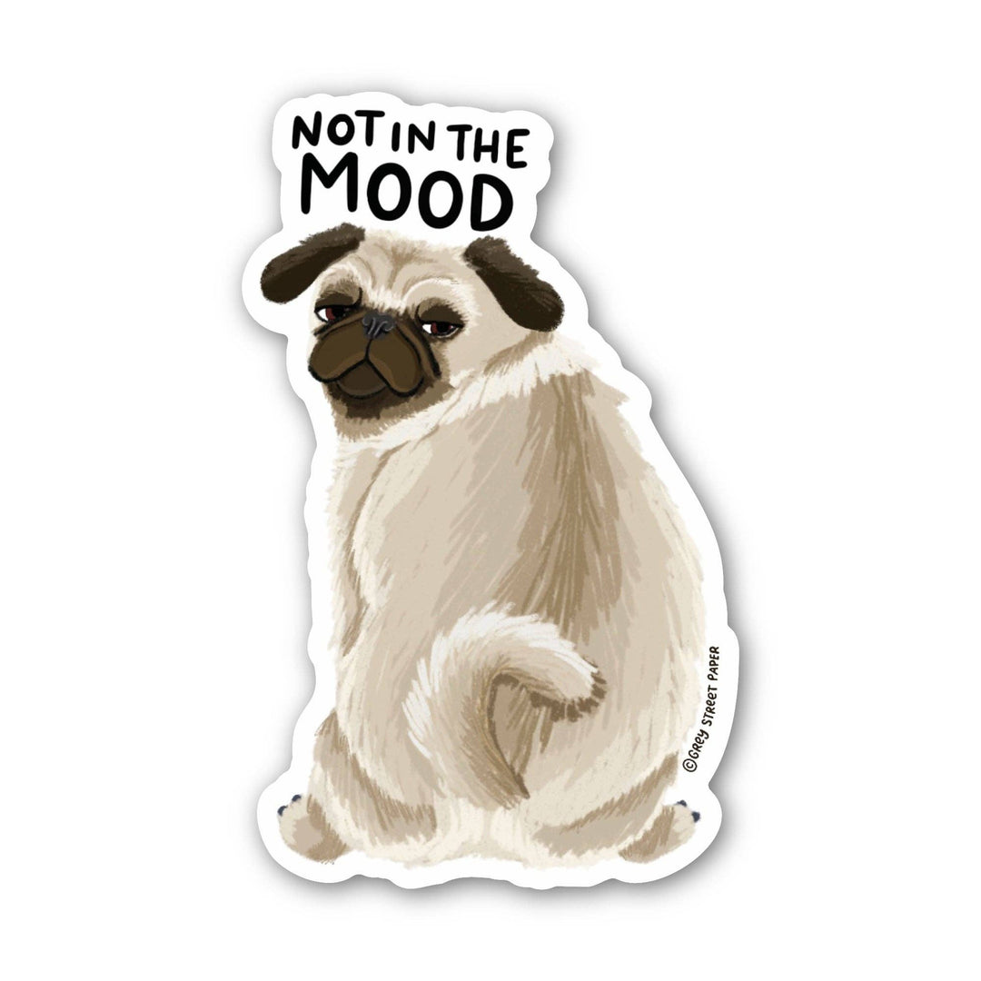 Irregularly shaped sticker with a beige and brown pug looking over its shoulder under the text 'not in the mood.'
