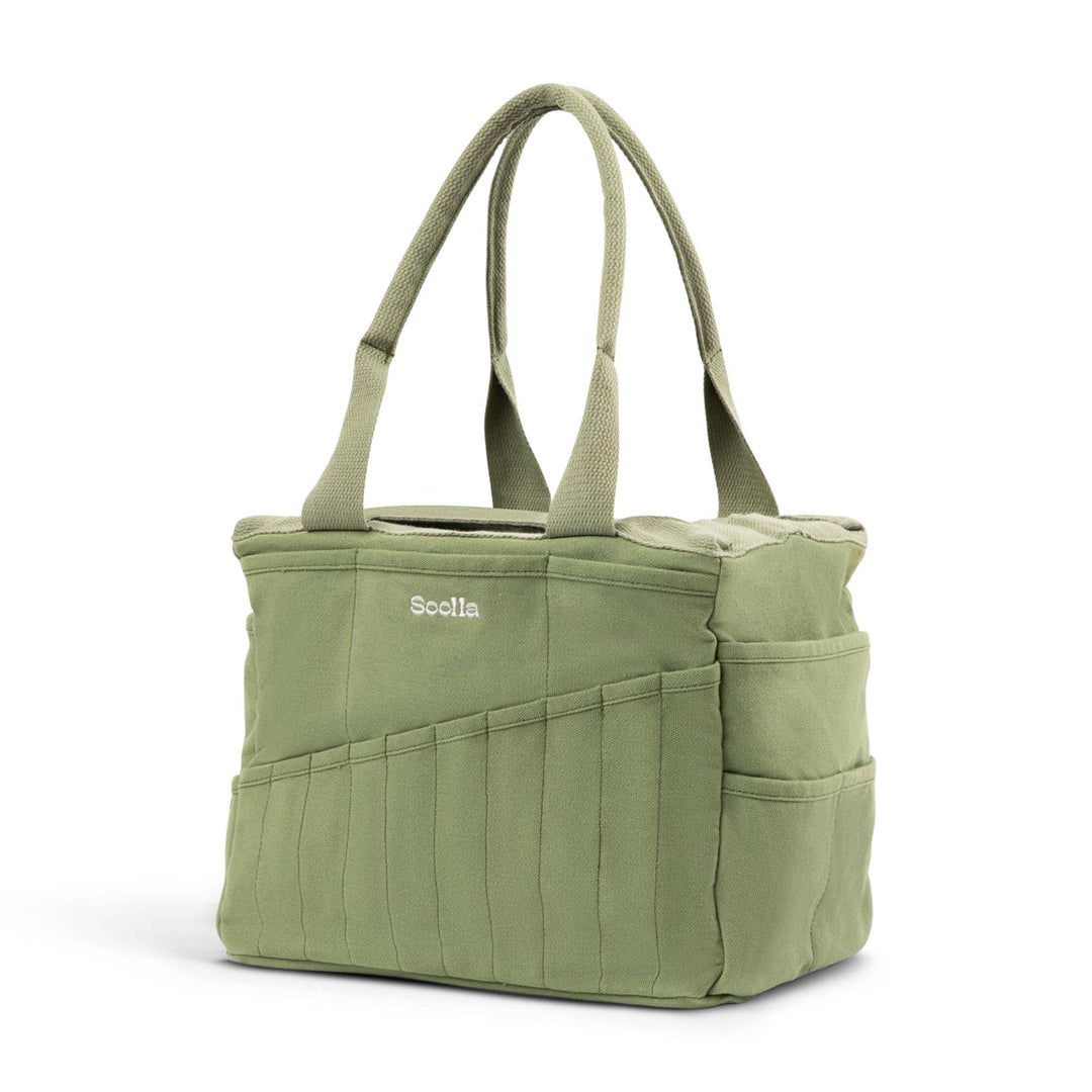 Green studio bag at an angle, with 10 narrow pockets on the long side and two wider pockets on the end side. 