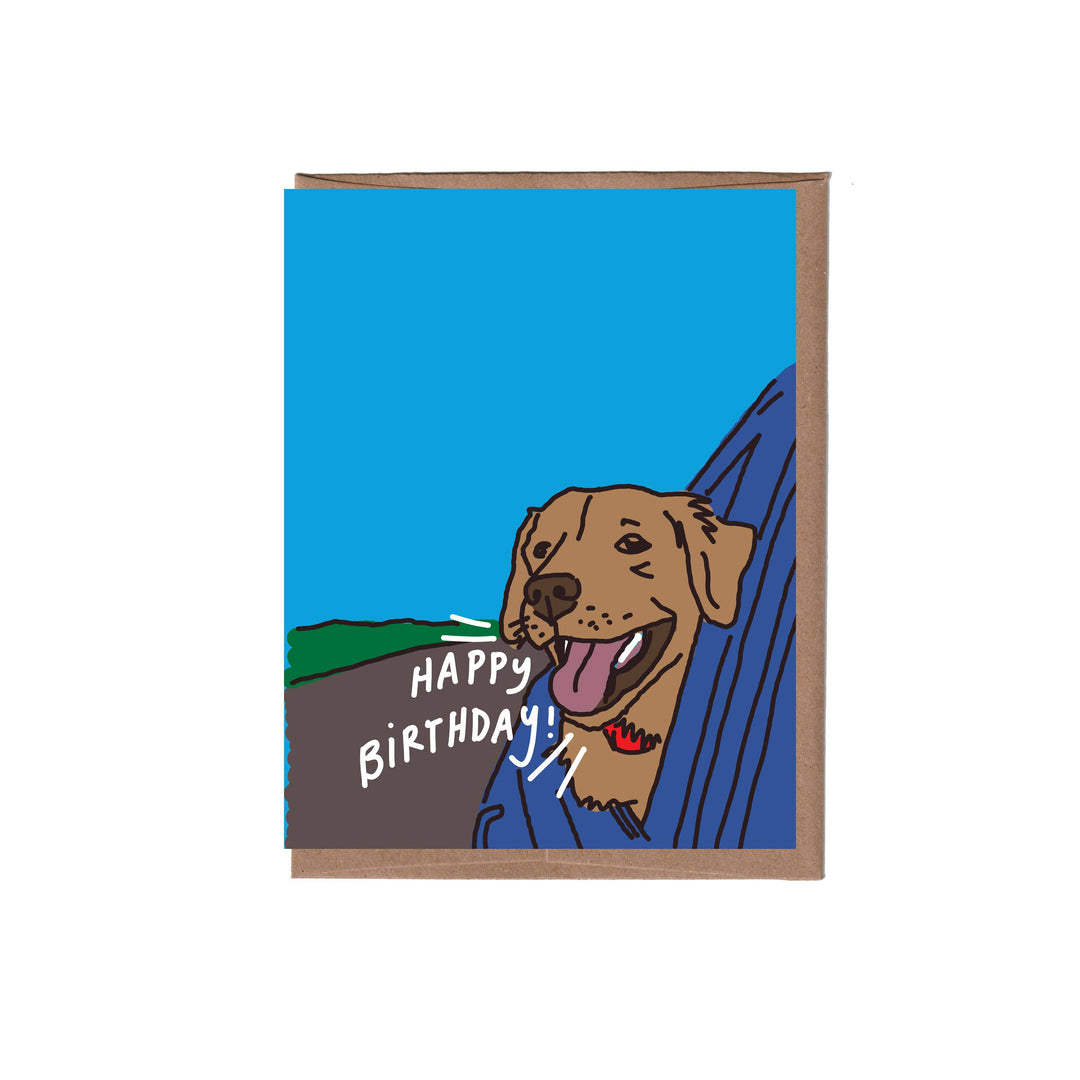 Birthday card with a dog illustration and 'Happy Birthday!' text on a blue background