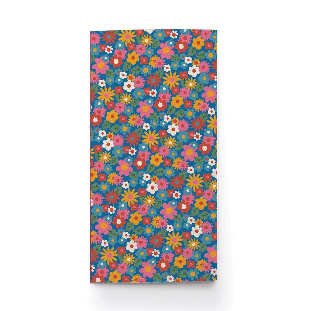 Cover of notebook with colorful floral pattern.